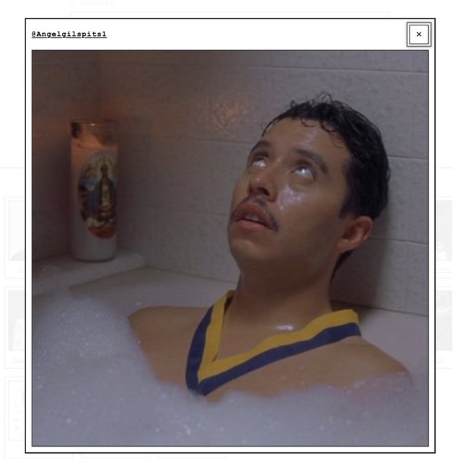 An image credited to @Angelgilespitsel showing a young man in a Lakers jersey soaking in a bubble bath with a prayer candle on the ledge, eyes rolled back.