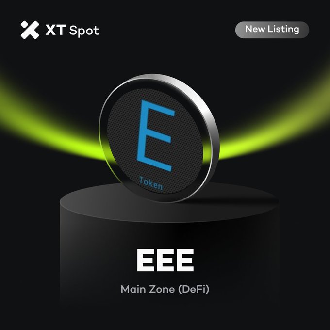 A 3D graphic of a dark metallic coin with the letter 'E' and 'Token' resting on a black pedestal against a black background, displaying the logo for XT Spot and text announcing a 'New Listing' for 'EEE Main Zone (DeFi)'.
