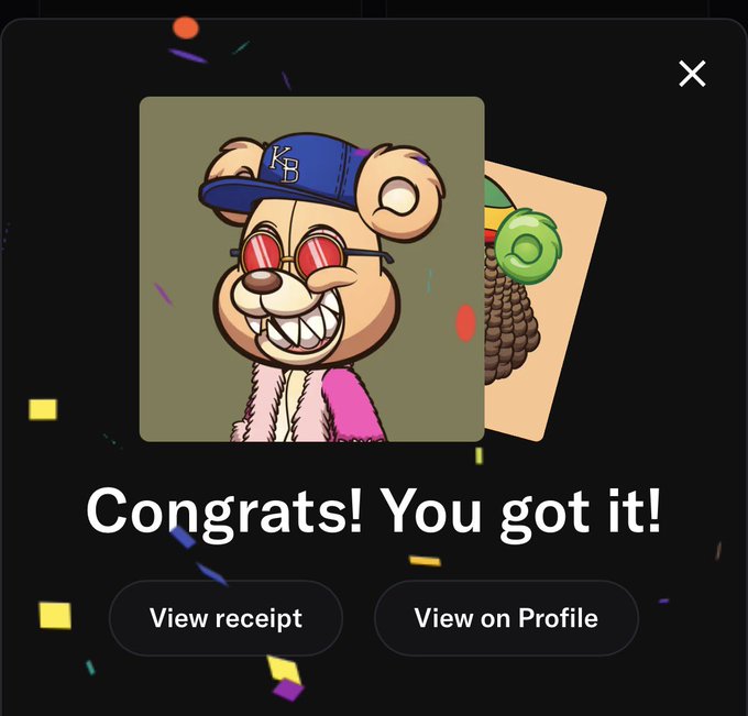 A digital popup screen displays a cartoon bear NFT wearing red sunglasses and a blue 'KB' cap, with the text 'Congrats! You got it!' and buttons reading 'View receipt' and 'View on Profile'.