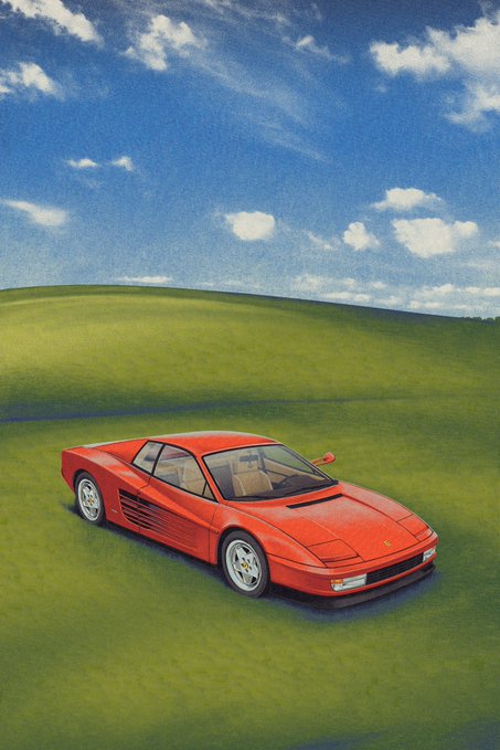 A red Ferrari Testarossa sports car is parked on a vast, grassy green field under a bright blue sky dotted with white clouds.
