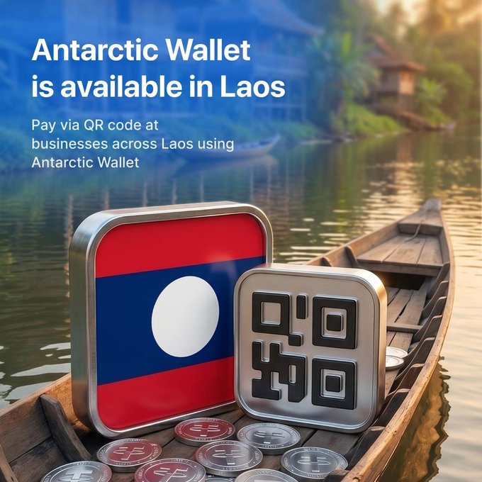 A promotional graphic announces "Antarctic Wallet is available in Laos," encouraging users to "Pay via QR code at businesses across Laos using Antarctic Wallet." The image features a Laos flag icon alongside a QR code symbol, set against a scenic backdrop of a wooden boat on calm waters, with scattered crypto coins reinforcing the digital payment theme.