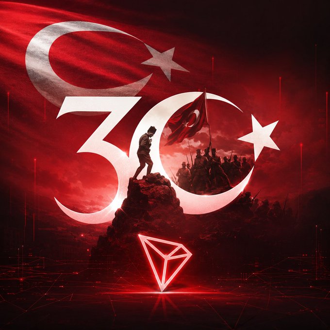 A dramatic red-toned commemorative graphic features a soldier standing atop a rocky outcrop with Turkish flags and "30" prominently displayed, alongside a glowing geometric crystal below. The post honors Turkey's Victory Day (30 Ağustos Zafer Bayramı), celebrating the 104th anniversary of the independence struggle and paying tribute to Mustafa Kemal Atatürk and all heroes who fought for the nation's freedom.