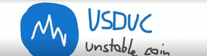 A hand-drawn logo featuring a blue blob with an 'M' line graph inside, accompanied by the text 'VSDUC unstable coin'.