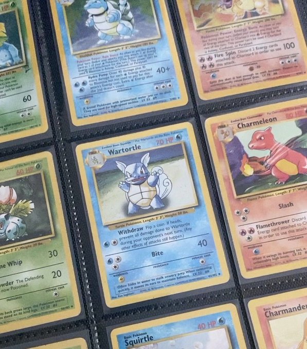A page of Pokemon trading cards in a binder, featuring cards like Wartortle, Blastoise, Charmeleon, Ivysaur, and Squirtle in clear protective sleeves.