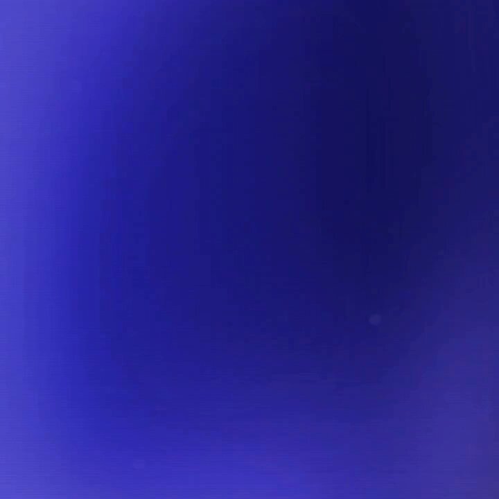 The image shows a close-up view of a blue background with a white dot, which appears to be floating or hovering in the air. The text above the image reads "After receiving $XRP then what? Can you easily turn it into money you can spend?" This suggests that there might be an advertisement for Bitcoin or cryptocurrency exchange services related to the blue background and white dot.