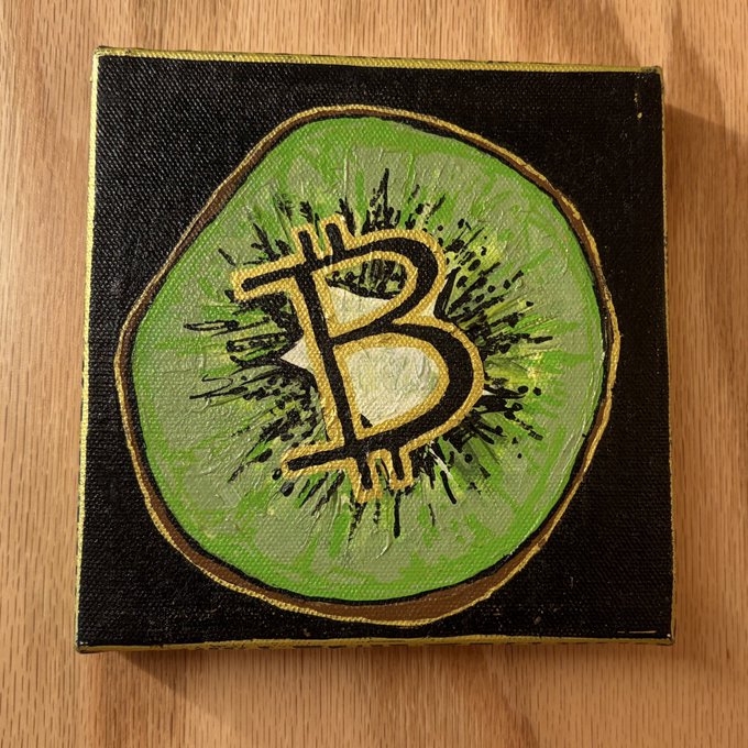 A small canvas painting featuring the letter "B" rendered in the Bitcoin logo style, with a green circular background and gold/black accents, now displayed as artwork above another Bitcoin-related piece.