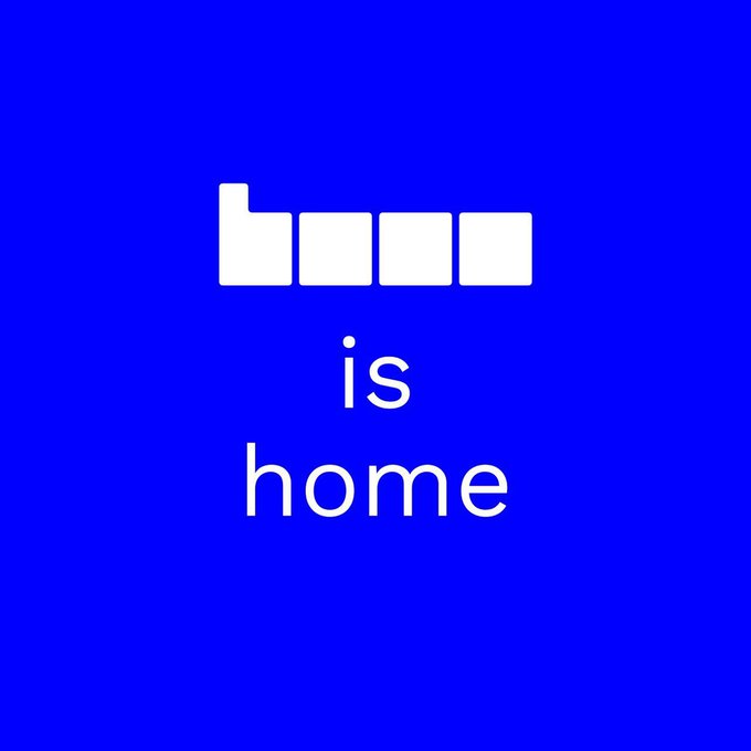 A simple blue graphic with a white pixelated logo and the text "is home".