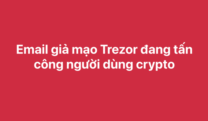 A red graphic with white Vietnamese text reading 'Email giả mạo Trezor đang tấn công người dùng crypto' (Fake Trezor emails are attacking crypto users).