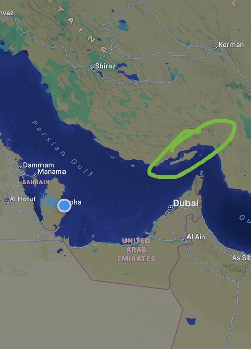 A satellite map of the Persian Gulf region showing parts of Iran, Saudi Arabia, UAE, Qatar, and Bahrain, with a green circle highlighting an area across the strait between Iran and the UAE.