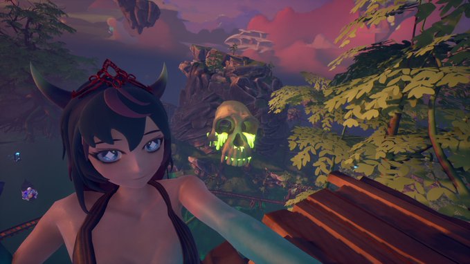 A stylized 3D-rendered female character with dark hair and horns taking a selfie, with a glowing green skull and tropical landscape visible in the background.