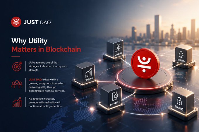 A promotional graphic for JUST DAO titled "Why Utility Matters in Blockchain," featuring a central red logo surrounded by connected 3D cubes labeled "LENDING," "LIQUIDITY," "TRADING," "PAYMENTS," and "STAKING."