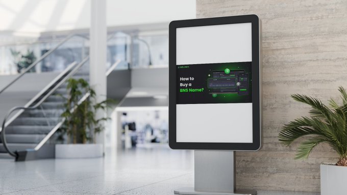 A digital advertising kiosk in a modern building lobby displays a screen asking 'How to Buy a DNS Name?' with green graphics.