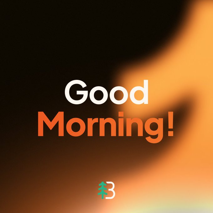 A 'Good Morning!' graphic with white and orange text on a dark blurred background with a tree logo.