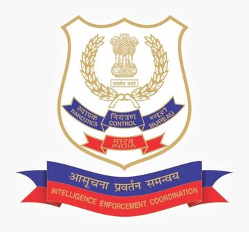 The image displays an official emblem featuring India's Lion Capital at the top, surrounded by wheat sheaves, with three flags reading "NARCOTICS," "CONTROL," and "BUREAU," and the Hindi text "सत्यमेव जयते" (Truth Alone Triumphs) and "भारत" (India). Below the shield is a red banner stating "आसूचना प्रवर्तन समन्वय" and "INTELLIGENCE ENFORCEMENT COORDINATION."

This emblem is related to the NCB (Narcotics Control Bureau) operations in India, directly tying into the post about the major darknet drug bust "Operation Ketamelon," where the agency worked with Binance to trace cryptocurrency transactions and identify the wallets behind the drug empire run by Edison Babu.