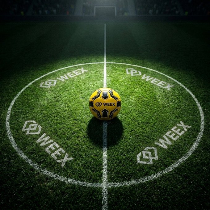 A dramatic stadium scene with a yellow and black WEEX-branded soccer ball placed on the center spot of a lit football pitch, with WEEX logos surrounding it.