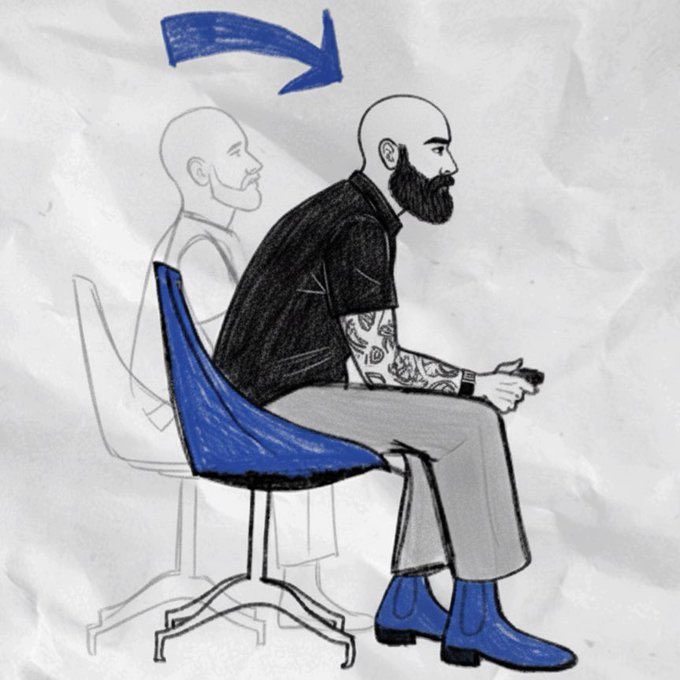 An illustrated diagram shows a bald, bearded man with tattooed arms sitting forward on a chair, with a faded outline of himself behind him and a blue arrow indicating forward movement, illustrating proper sitting posture.