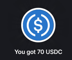 A notification graphic from a cryptocurrency wallet app showing the USDC logo with the text 'You got 70 USDC' on a dark background.
