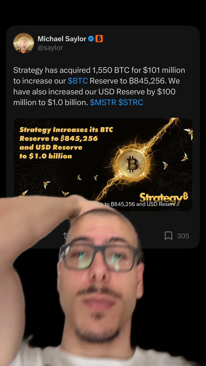The image features a man wearing glasses, with his head tilted back as if he's scratching his head or thinking about something. The background of the image is black, which contrasts with the white shirt that the man is wearing. In the center of the image, there is a Twitter account with a post from Michael Sayler, who has just posted an interesting caption related to Bitcoin and strategy.

The caption reads: "EVERYONE JUST GOT PLAYED BY MICHAEL SAYLOR YOU SOLD YOUR $BTC TOO EARLY AND HE BOUGHT MORE FOR A BETTER ENTRY". This post seems to be about the man's thoughts on a recent Bitcoin transaction, possibly discussing how he acquired more Bitcoins than expected.