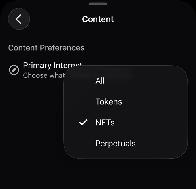 A mobile app interface displays a 'Content' preferences menu with the 'Primary Interest' option set to 'NFTs,' with other choices including 'All,' 'Tokens,' and 'Perpetuals.'