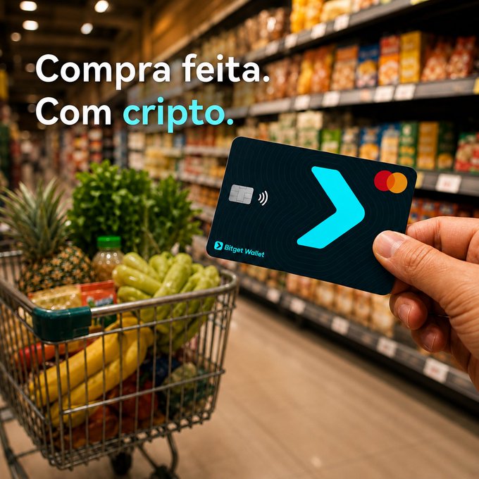 Advertisement showing a hand holding a black Bitget Wallet debit card with text 'Compra feita. Com cripto.' (Purchase made. With crypto.) over a supermarket aisle with a shopping cart full of groceries.