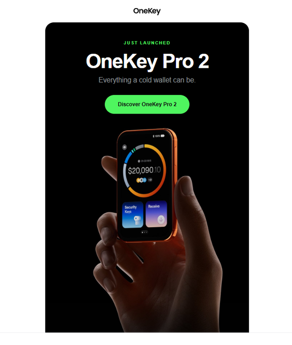 A promotional advertisement for 'OneKey Pro 2' featuring a hand holding a device displaying a balance of $20,090.10 with 'Security Keys' and 'Receive' options, under the tagline 'Everything a cold wallet can be.'