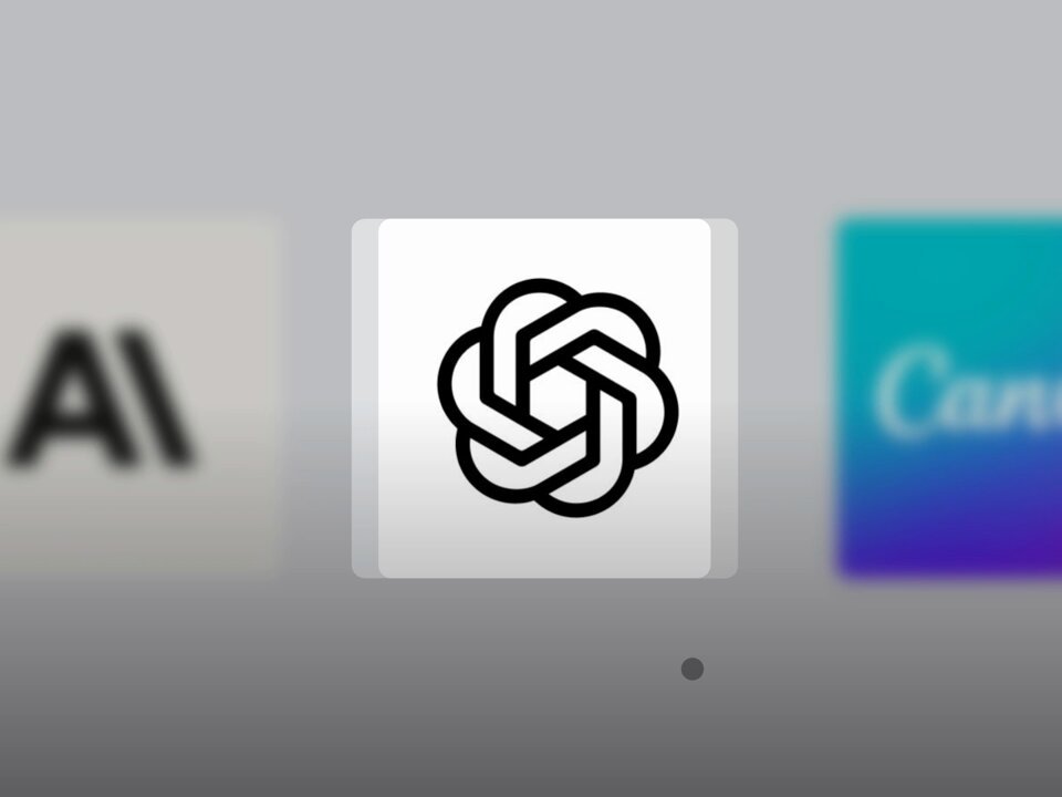 The image shows a graphic design of an emblem with a stylized flower at its center, accompanied by three logos representing different companies - "Al," "AI," and "CAN." The emblem features a black outline, giving it a striking appearance against the gray background. The first logo is the largest, while the other two are smaller in comparison to each other but still noticeable. In addition, there's a small white circle with a dot on it placed at the bottom right corner of the image. This graphic design and logo may be related to the topic of IPOs or companies like Bitcoin, as suggested by the caption above the image.