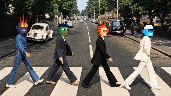 A photograph of the iconic Beatles Abbey Road album cover scene, humorously edited to show the four figures wearing pixelated Minecraft character heads.