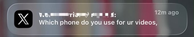 A Twitter/X mobile notification popup asks 'Which phone do you use for ur videos,' posted 12 minutes ago.