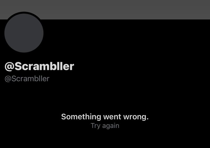 Error message screen displaying '@Scrambler' as the username with 'Something went wrong. Try again' shown in white text on a black background.