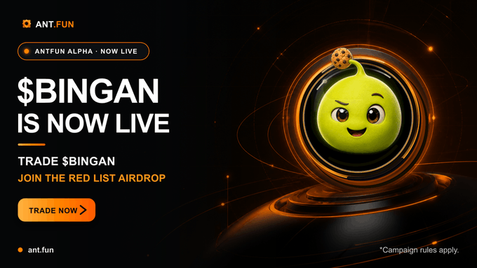 The image is a promotional banner for the cryptocurrency token "$BINGAN," announcing that it is now live on ANTFUN ALPHA for trading, with a call-to-action to "TRADE NOW" and join the Red List Airdrop rewards program. The banner features a cute green alien-like mascot character with a small cookie on its head, set against a sleek dark background with glowing orange circular accents and the website ant.fun listed at the bottom.