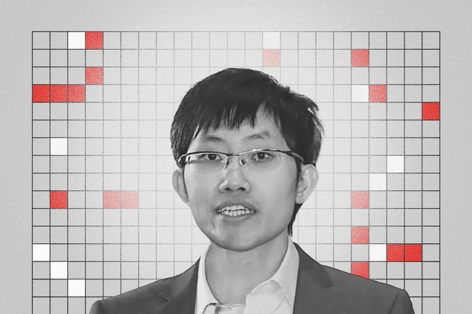 A black-and-white portrait of a bespectacled young man in a suit is overlaid with a grid of red and white highlighted squares, resembling a heatmap or data visualization—ironically fitting the "Most goated nerd" caption by framing him as an analytics subject.