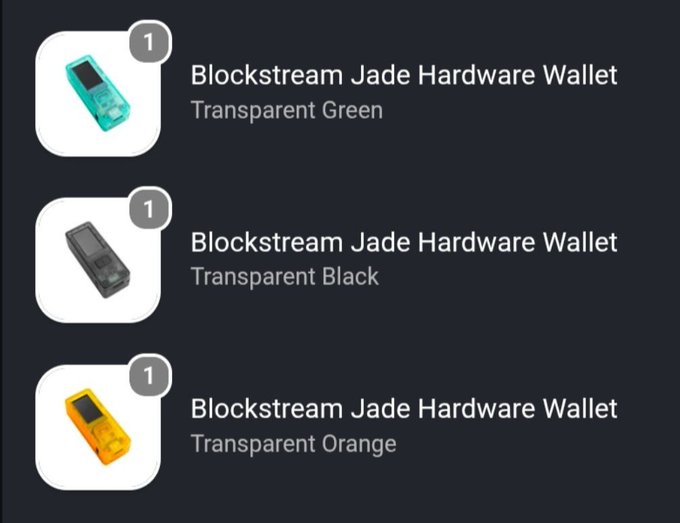 A product listing showing three color options (Transparent Green, Transparent Black, Transparent Orange) for the 'Blockstream Jade Hardware Wallet', each with a quantity of 1.
