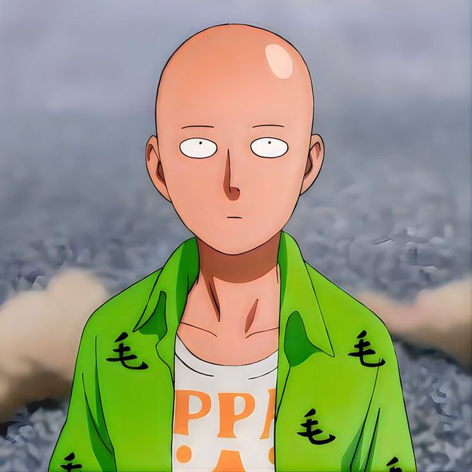 An anime-style illustration of a bald, wide-eyed character wearing a bright green shirt with black Asian characters and an orange 'PPAP' tank top underneath, set against a blurred rocky background.