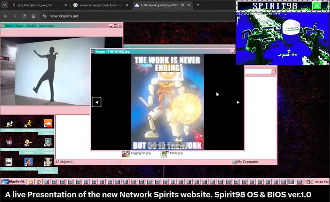 A live presentation of the new Network Spirits website and Spirit98 OS, featuring a retro computer interface with a meme image that reads 'THE WORK IS NEVER ENDING BUT SO IS THE WORK'.
