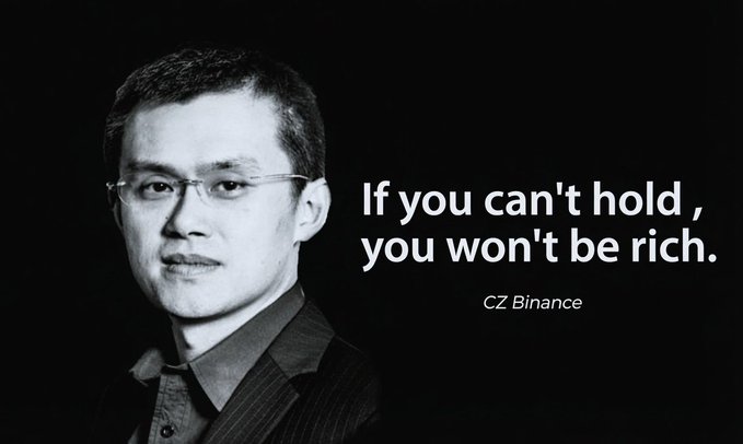 The image features a man wearing glasses, standing against a black background with his face clearly visible. Below him, there's text that reads "If you can't hold, you won't be rich." This quote appears to be attributed to CZ Binance, and it is written in a smaller font size than the rest of the image. The man's presence in front of this quote creates an interesting visual contrast between his face and the words above him.