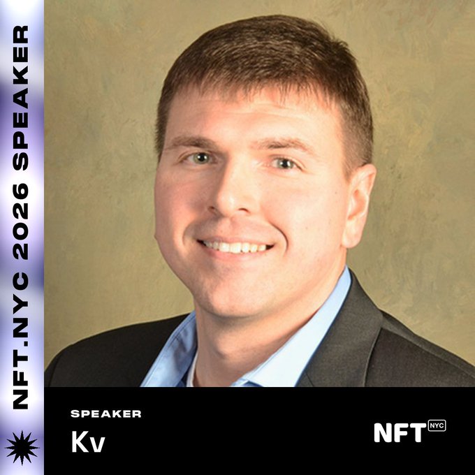 A professional headshot of a smiling man in a dark suit jacket and light blue shirt against a green backdrop, framed as an NFT.NYC 2026 speaker spotlight featuring the name "Kv" alongside the accompanying text highlighting him as co-founder of Alpha Origins and a Minnesota Crypto Council board member, set to appear at the Sept 1-3 event.