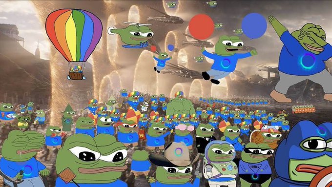 A crowded, surreal cartoon scene is filled with Pepe-style frog characters in blue outfits, with balloons, a hot-air balloon, and many figures in the background.