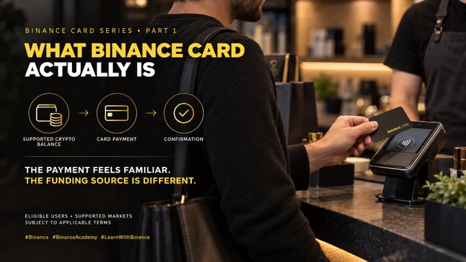 A customer uses a black Binance Card to pay at a café, tapping it on a contactless terminal, illustrating the post's explanation of Binance Card as a simple payment bridge where an "eligible supported crypto balance" funds a familiar card payment that ends in "confirmation."