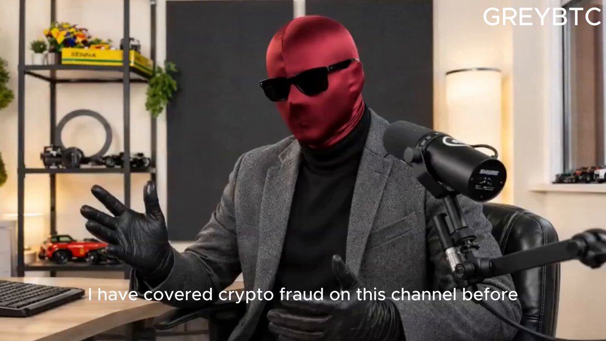 The image features a man wearing a red mask and sunglasses sitting at a desk with a microphone in front of him. The caption reads "I have covered crypto fraud on this channel before", indicating that he has been involved in covering up a massive crypto fraud scheme involving the FTX exchange.