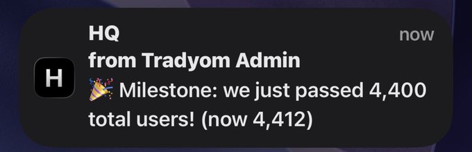 A mobile notification from HQ by Tradyom Admin announcing a milestone: 'we just passed 4,400 total users! (now 4,412)' with a party popper emoji.