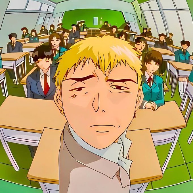 Anime-style illustration of a blonde-haired student taking a selfie in a classroom filled with other students at their desks.
