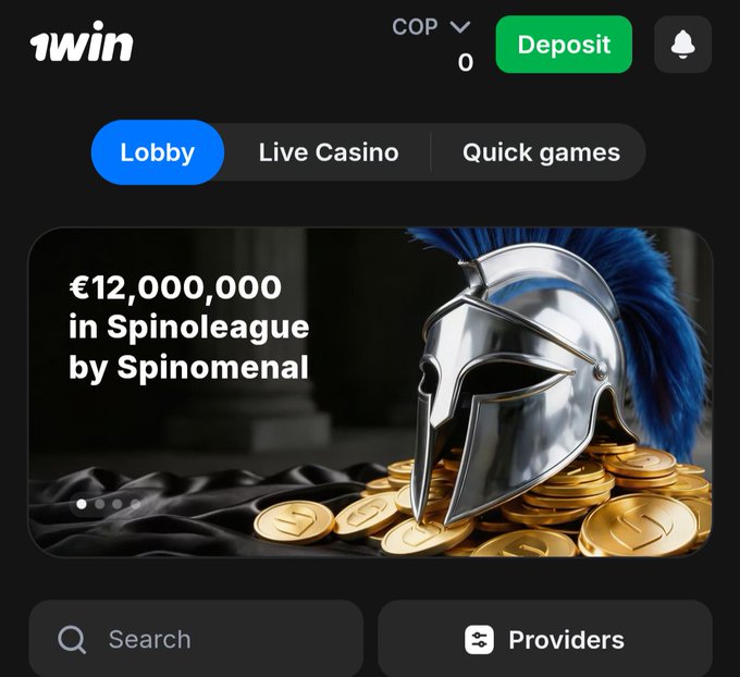 A screenshot of the '1win' gambling app lobby displaying a 'Spinoleague by Spinomenal' promotion with a €12,000,000 prize pool, featuring a Spartan helmet on a pile of gold coins.