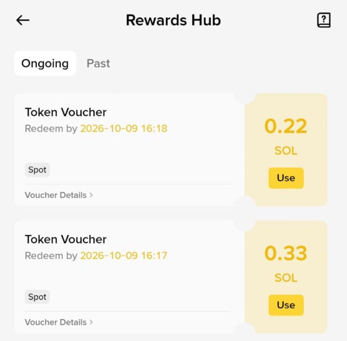 The image shows a "Rewards Hub" screen displaying two unclaimed Token Vouchers for 0.22 SOL (redeemable until 2026-10-09 16:18) and 0.33 SOL (redeemable until 2026-10-09 16:17), both tagged as "Spot" rewards with "Use" buttons. This aligns with the post celebrating a small reward win from a Binance campaign, where the user received token vouchers as part of a promotional reward.