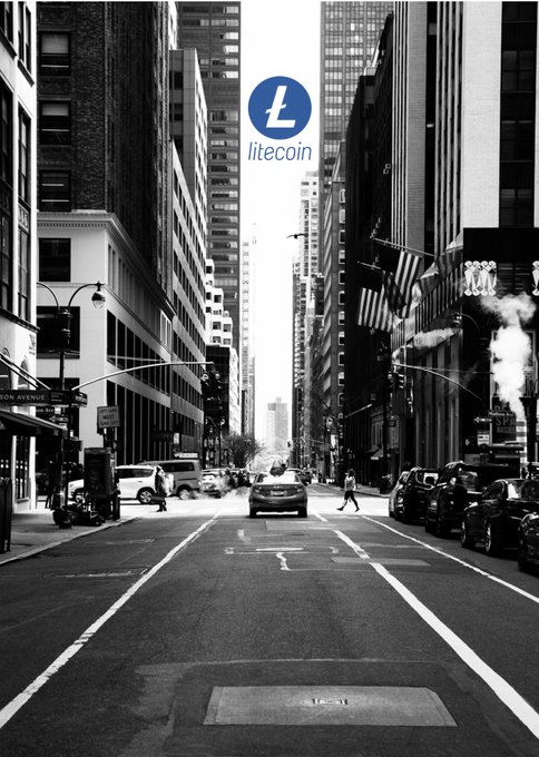 A black-and-white photograph of a bustling New York City street, with tall buildings flanking a road where cars and pedestrians are visible, overlaid with the Litecoin logo and the text "litecoin" near the top of the image.