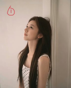 A profile photo of a young woman with long dark hair wearing a white polka dot top, leaning against a white doorframe with a small red hand-drawn doodle in the corner.