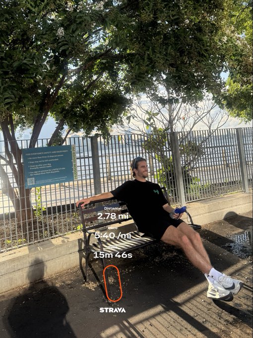 A man sits on a park bench wearing a black t-shirt with a "Hyperliquid" logo, celebrating his Strava run with stats of 2.78 miles distance, 5:40/mi pace, and 15m 46s time, while the post highlights $HYPE reaching all-time highs.