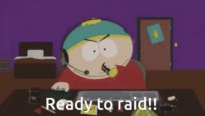 The image features a cartoon character, likely a character from the popular television show "South Park", sitting at a desk with a computer monitor in front of him. The character has a headset on his head and appears to be engaged in an activity related to gaming or streaming. Above the character's head, there is text that reads "Ready to raid!". This suggests that the cartoon character might be preparing for an online gaming session or streaming event.