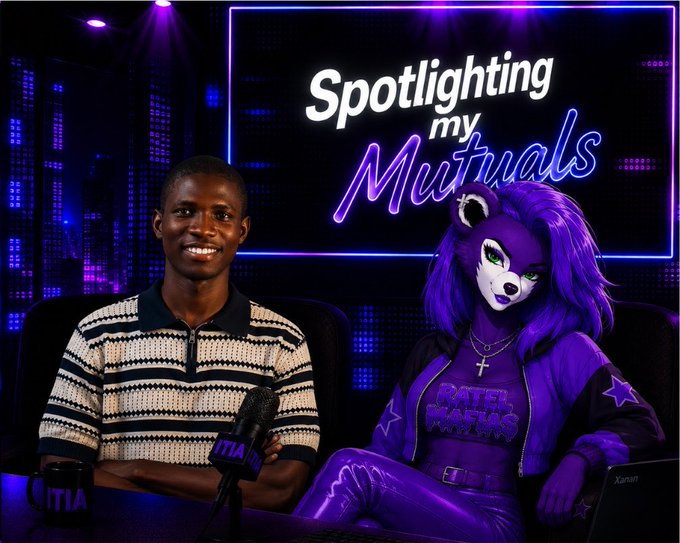 A man and a purple anthropomorphic lion character sit at a talk show desk beneath a neon sign reading 'Spotlighting my Mutuals,' with the character wearing a 'Hotel Mutuals' jacket.