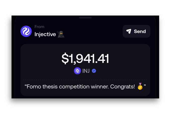 A screenshot showing a crypto transaction notification from Injective (🦊) sending $1,941.41 worth of INJ, accompanied by a message reading "Fomo thesis competition winner. Congrats!" -- illustrating the author's prize for winning the Injective Fomo thesis competition worth approximately $2,000.