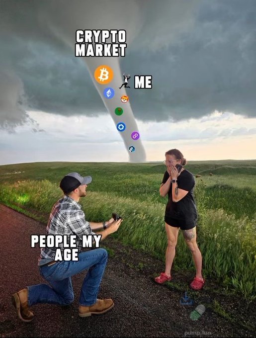 A man kneels to propose with "PEOPLE MY AGE" labeled on him, while "ME" is being swept away by a tornado of crypto coins (Bitcoin, Ethereum, and others) labeled "CRYPTO MARKET." The meme humorously captures the sentiment of being "cooked"—watching peers settle into life milestones while being tossed around by volatile crypto losses.